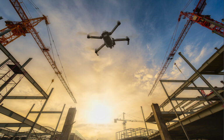drone over construction site. video surveillance or industrial i