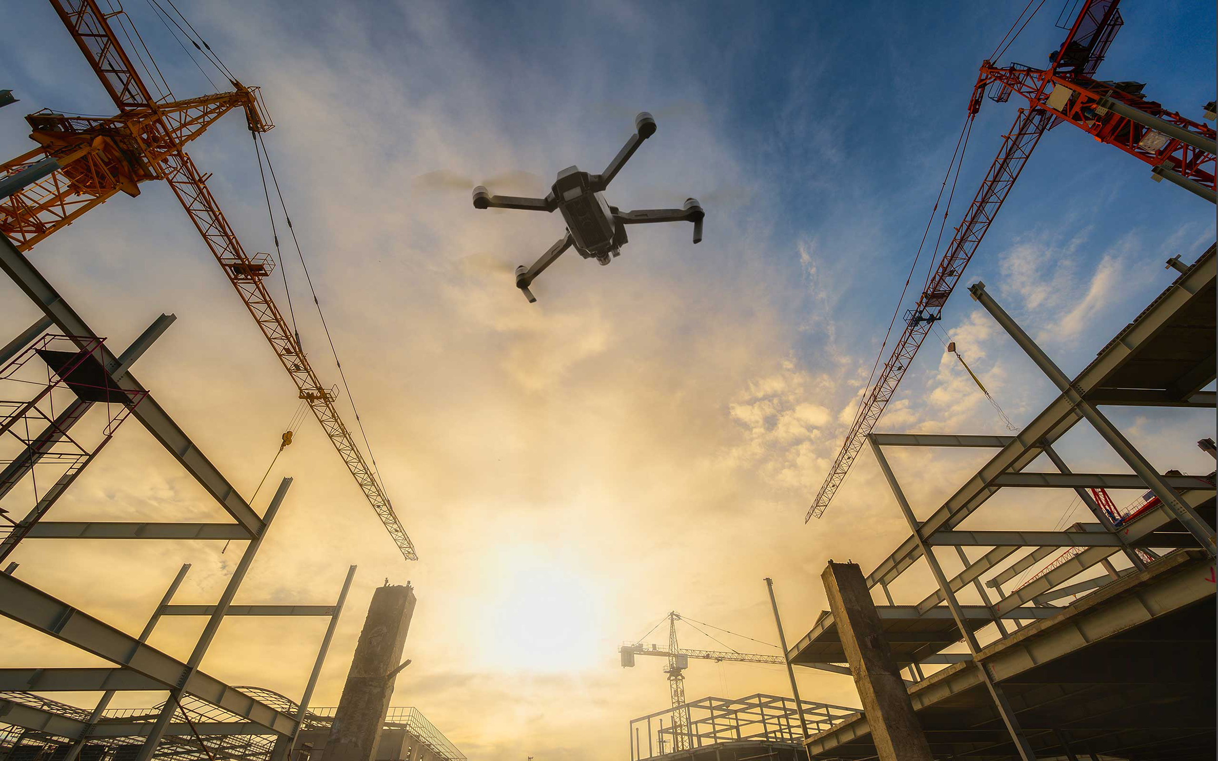 drone over construction site. video surveillance or industrial i
